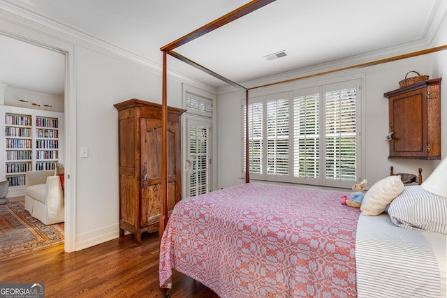 1717 N Decatur Rd NE Unit 214, Atlanta, GA 30307 - bedroom with baseboards, visible vents, ornamental molding, and wood finished floors
