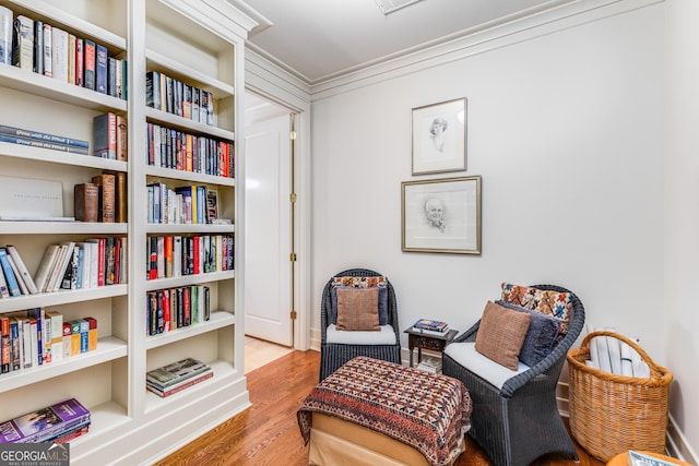1717 N Decatur Rd NE Unit 214, Atlanta, GA 30307 - living area with ornamental molding and wood finished floors