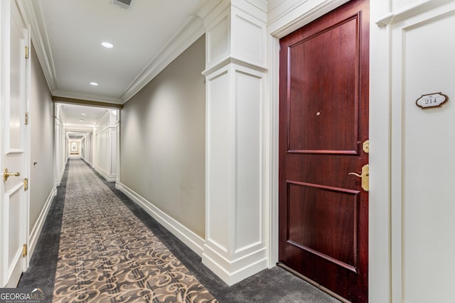 1717 N Decatur Rd NE Unit 214, Atlanta, GA 30307 - hallway featuring visible vents, ornamental molding, dark colored carpet, baseboards, and recessed lighting