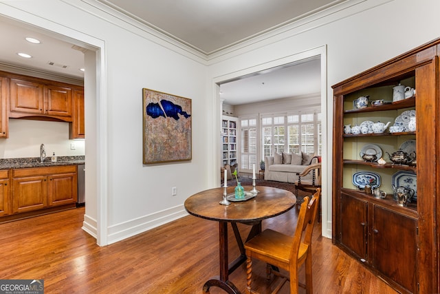 1717 N Decatur Rd NE Unit 214, Atlanta, GA 30307 - dining space with recessed lighting, baseboards, wood finished floors, visible vents, and ornamental molding