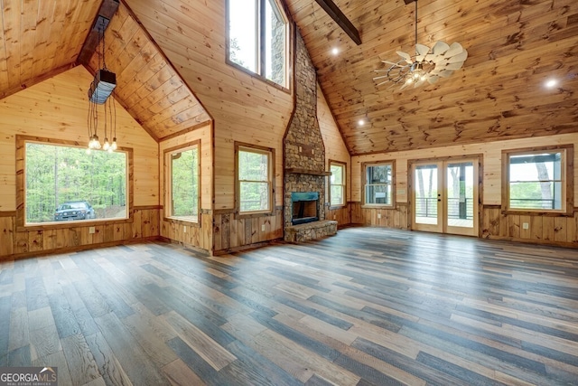 171 Antler Way, Morganton, GA 30560 - unfurnished living room with wood finished floors, wood walls, wooden ceiling with exposed beams, plenty of natural light, and high vaulted ceiling