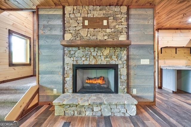 171 Antler Way, Morganton, GA 30560 - detailed view of wooden ceiling, wooden walls, wood finished floors, a stone fireplace, and baseboards