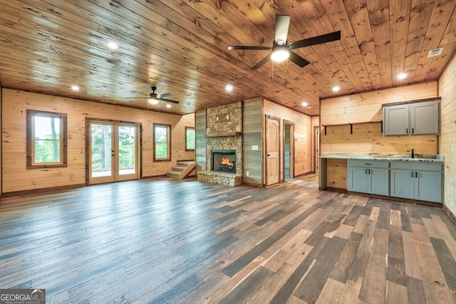 171 Antler Way, Morganton, GA 30560 - unfurnished living room featuring wooden ceiling, a ceiling fan, french doors, dark wood-style floors, and wooden walls