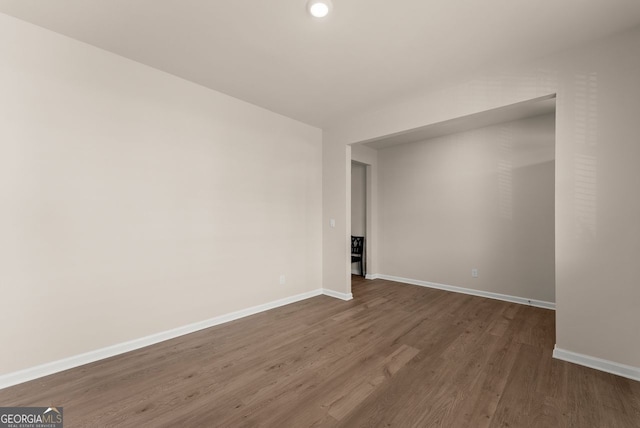 352 Walnut Grove Way, Pendergrass, GA 30567 - spare room featuring baseboards, dark wood-type flooring, and recessed lighting