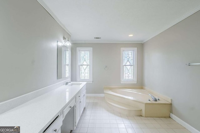 5611 Manassas Run, Stone Mountain, GA 30087 - bathroom with baseboards, visible vents, a garden tub, vanity, and crown molding