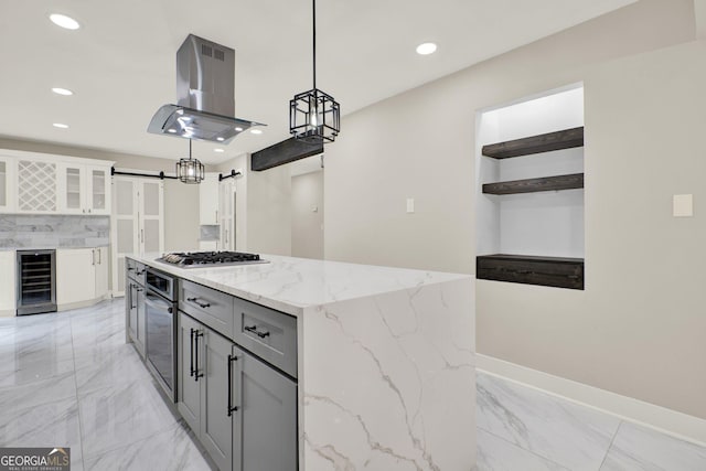 kitchen with open shelves, appliances with stainless steel finishes, beverage cooler, marble finish floor, and island exhaust hood