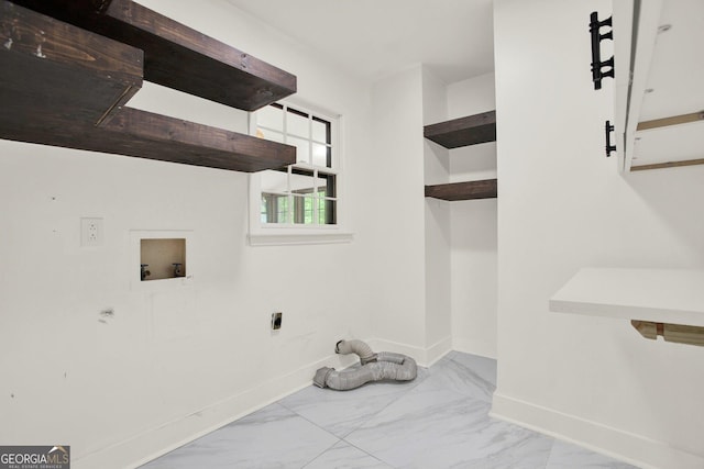 clothes washing area featuring baseboards, electric dryer hookup, washer hookup, and marble finish floor