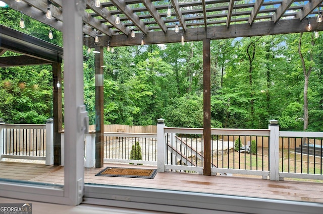 wooden deck with a pergola