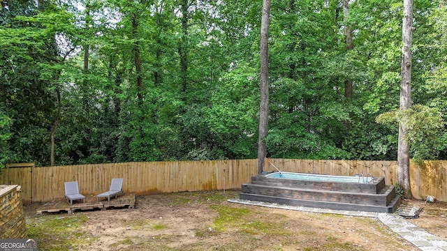 view of yard featuring a fenced backyard