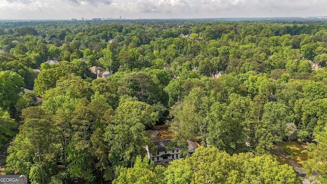 aerial view featuring a view of trees