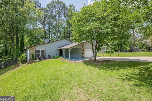 9985 Lake Forest Way, Roswell, GA 30076 - single story home with driveway, a chimney, a garage, fence, and a front lawn