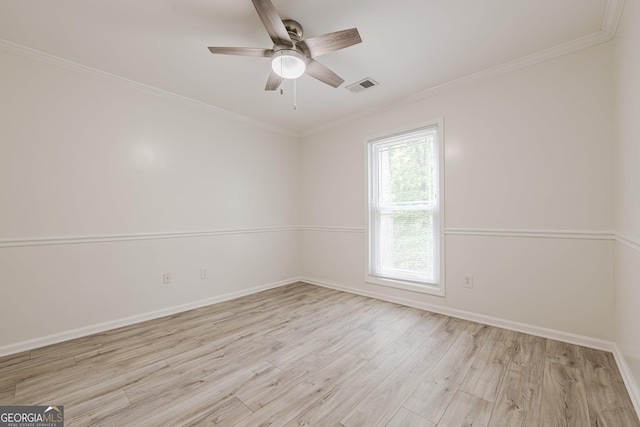 9985 Lake Forest Way, Roswell, GA 30076 - empty room with visible vents, ornamental molding, wood finished floors, baseboards, and ceiling fan