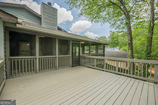 9985 Lake Forest Way, Roswell, GA 30076 - wooden deck featuring a sunroom