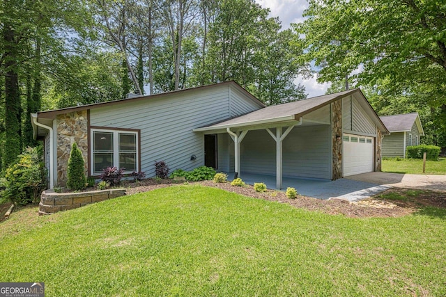 9985 Lake Forest Way, Roswell, GA 30076 - view of front of home with an attached garage, driveway, a front lawn, and stone siding