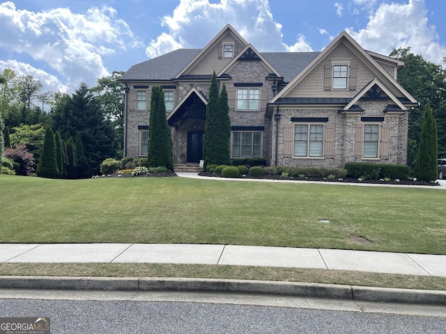 2220 Cambridge Hill Ct, Dacula, GA 30019 - craftsman-style house featuring brick siding and a front lawn