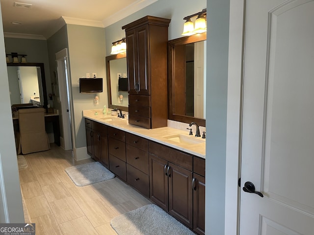 2220 Cambridge Hill Ct, Dacula, GA 30019 - bathroom featuring double vanity and crown molding