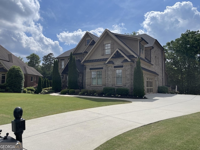 2220 Cambridge Hill Ct, Dacula, GA 30019 - view of front of property featuring brick siding, a front yard, and concrete driveway
