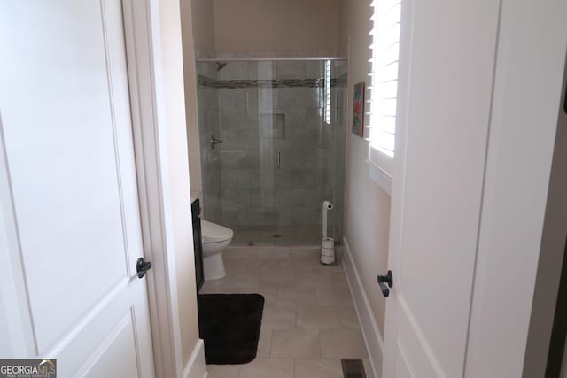2220 Cambridge Hill Ct, Dacula, GA 30019 - bathroom with a shower stall, toilet, and tile patterned floors
