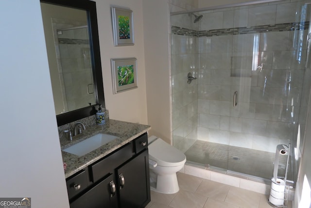 2220 Cambridge Hill Ct, Dacula, GA 30019 - bathroom with vanity, a shower stall, toilet, and tile patterned flooring