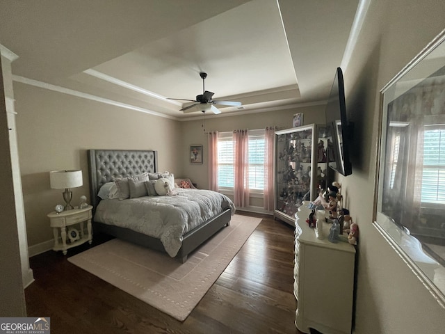 2220 Cambridge Hill Ct, Dacula, GA 30019 - bedroom featuring a tray ceiling, wood finished floors, ceiling fan, and crown molding