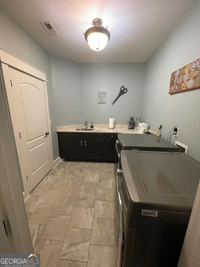 2220 Cambridge Hill Ct, Dacula, GA 30019 - washroom featuring cabinet space and independent washer and dryer
