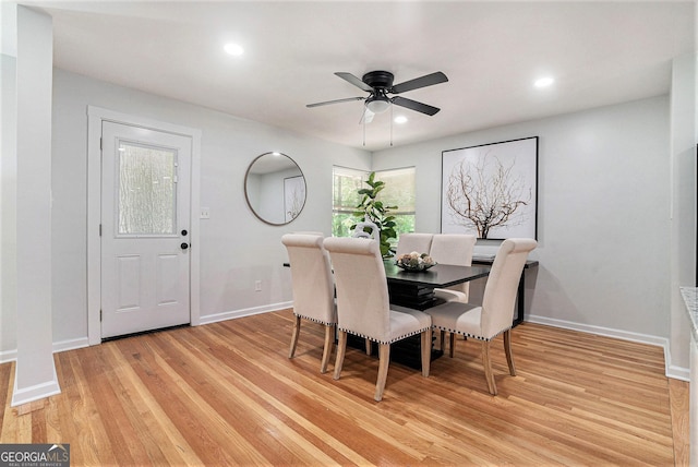 dining room with light wood-style floors, baseboards, a ceiling fan, and recessed lighting