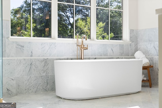 490 Mount Paran Rd, Atlanta, GA 30327 - bathroom with tile walls, plenty of natural light, and a sink