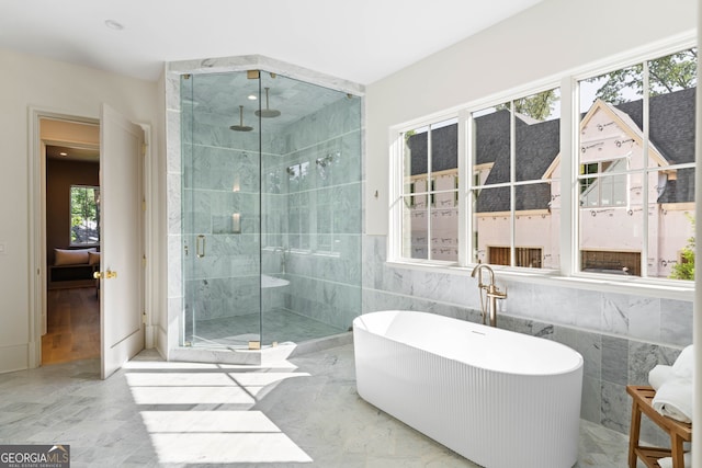 490 Mount Paran Rd, Atlanta, GA 30327 - bathroom with a stall shower, tile walls, and a soaking tub