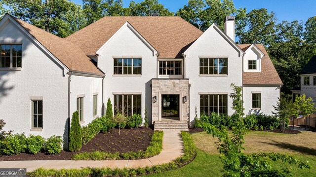 490 Mount Paran Rd, Atlanta, GA 30327 - view of front of home with a chimney, roof with shingles, and a front lawn