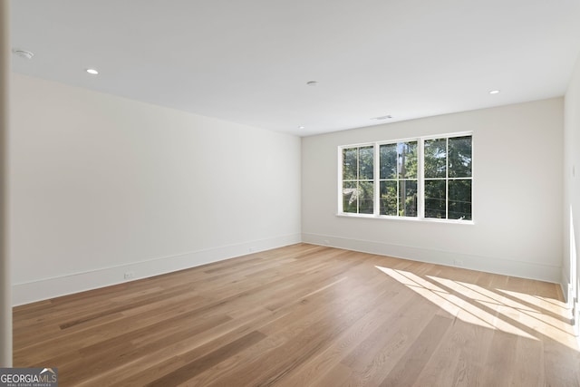 490 Mount Paran Rd, Atlanta, GA 30327 - unfurnished room with light wood-style flooring, baseboards, and recessed lighting