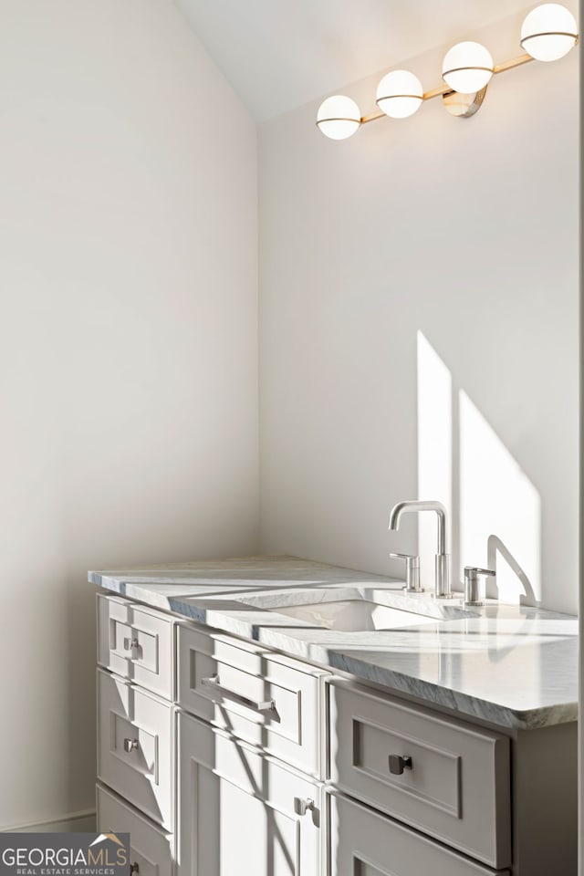 490 Mount Paran Rd, Atlanta, GA 30327 - kitchen featuring gray cabinetry and lofted ceiling