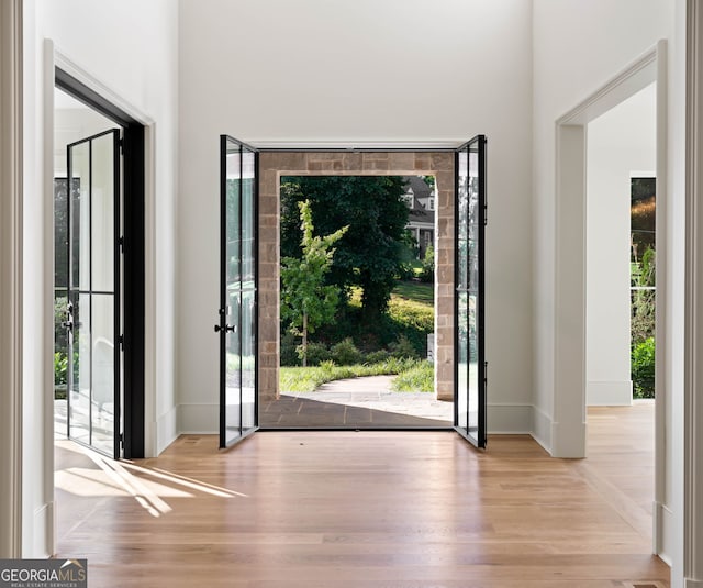 490 Mount Paran Rd, Atlanta, GA 30327 - foyer entrance featuring wood finished floors, healthy amount of natural light, and baseboards