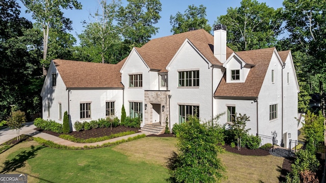 490 Mount Paran Rd, Atlanta, GA 30327 - view of front of house featuring a chimney, roof with shingles, and stucco siding