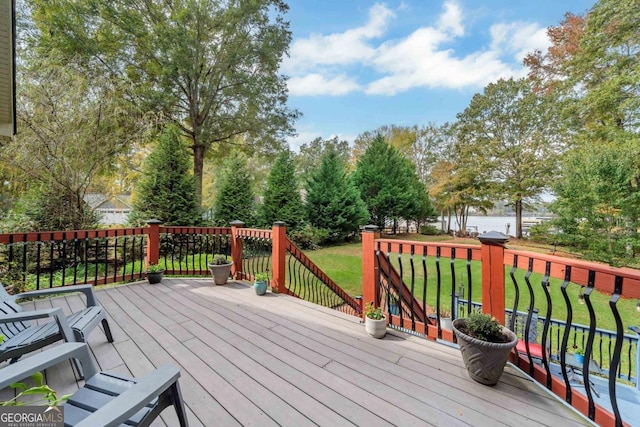 wooden deck with a yard
