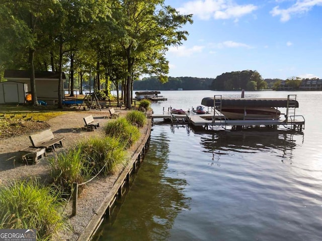 view of dock featuring a water view