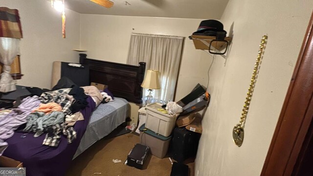 bedroom featuring carpet