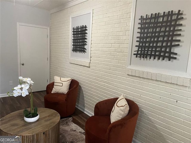 2135 Niskey Lake Rd, Atlanta, GA 30331 - living area with wood finished floors and brick wall