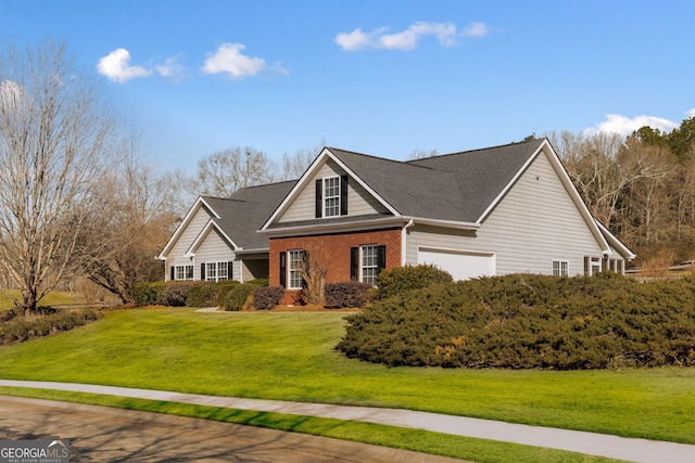 17 Castleview Ct, Jefferson, GA 30549 - view of front facade with brick siding, an attached garage, roof with shingles, and a front yard