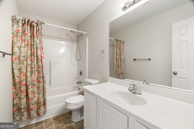 17 Castleview Ct, Jefferson, GA 30549 - full bath featuring vanity, toilet, a textured ceiling, and shower / tub combo