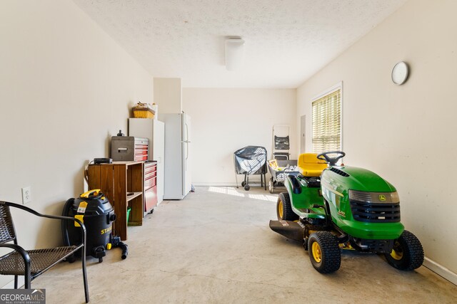 17 Castleview Ct, Jefferson, GA 30549 - playroom with baseboards, a textured ceiling, and concrete flooring