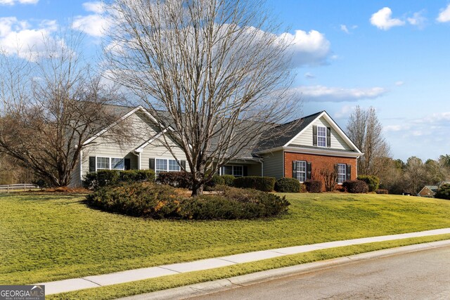 17 Castleview Ct, Jefferson, GA 30549 - view of front of house with a front lawn and brick siding