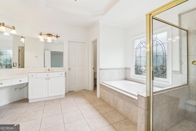 bathroom with crown molding, tile patterned floors, tiled shower, and vanity