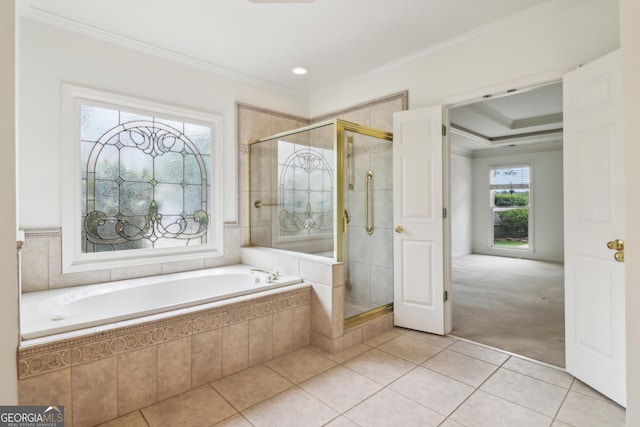 full bathroom featuring crown molding, tile patterned flooring, a stall shower, and a bath