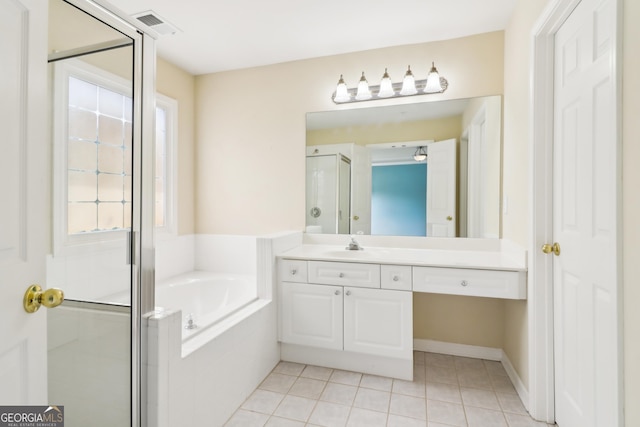 bathroom featuring a garden tub, visible vents, a shower stall, vanity, and tile patterned floors