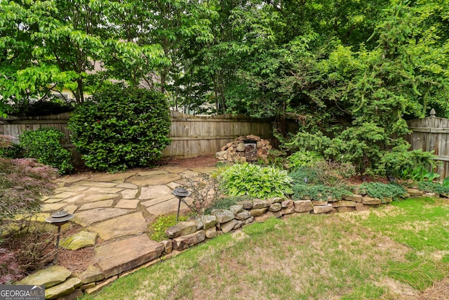 view of yard featuring a fenced backyard