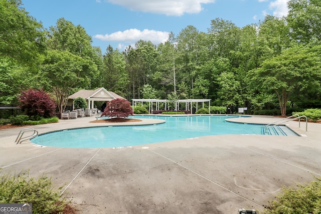 community pool featuring a patio and a pergola