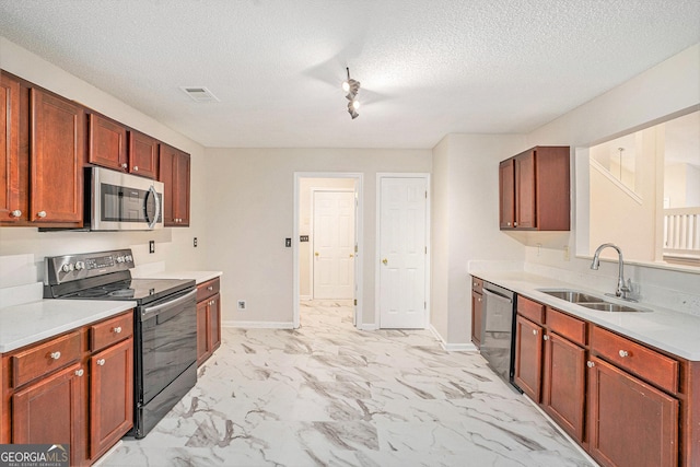 4795 Wilkins Station Dr, Decatur, GA 30035 - kitchen with visible vents, a sink, light countertops, and stainless steel appliances