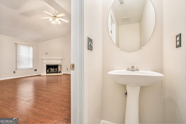 4795 Wilkins Station Dr, Decatur, GA 30035 - bathroom with a ceiling fan, visible vents, wood finished floors, and lofted ceiling