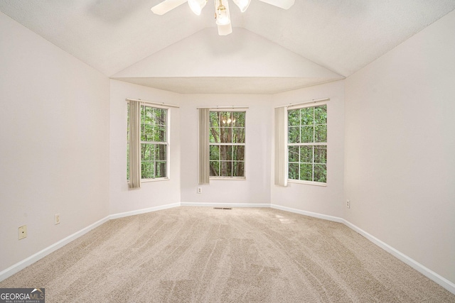 4795 Wilkins Station Dr, Decatur, GA 30035 - carpeted spare room with a ceiling fan, baseboards, vaulted ceiling, and visible vents