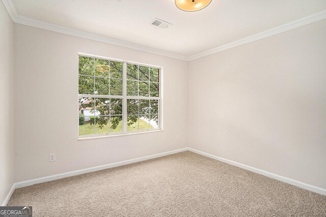 4795 Wilkins Station Dr, Decatur, GA 30035 - carpeted spare room featuring visible vents, ornamental molding, and baseboards